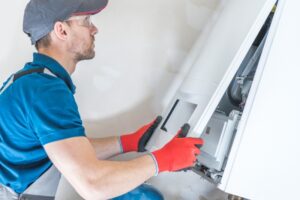 technician-installing-furnace