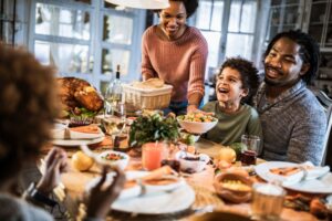 family-around-kitchen-table-for-holiday