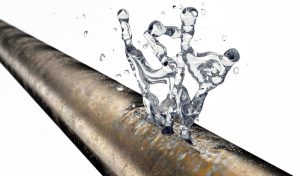 water-spurting-from-a-damaged-pipe